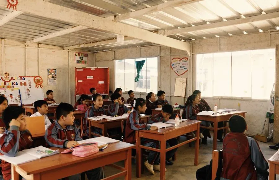 Pupils at work in a simple classroom